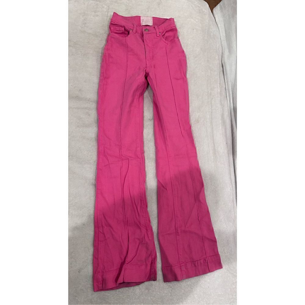 REVICE denim pink jeans size 24 with huge star on the back
